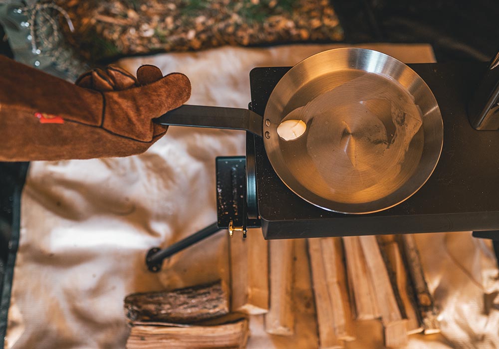Готвене в шестместна типи палатка Robens Klondike